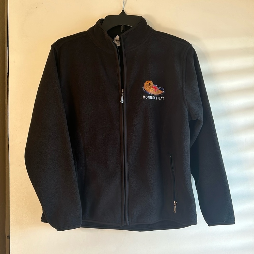 Brand new Women’s zip up Monterey Bay black sweatshirt. Size medium.